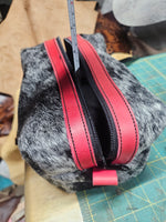 Pink cowhide travel bag